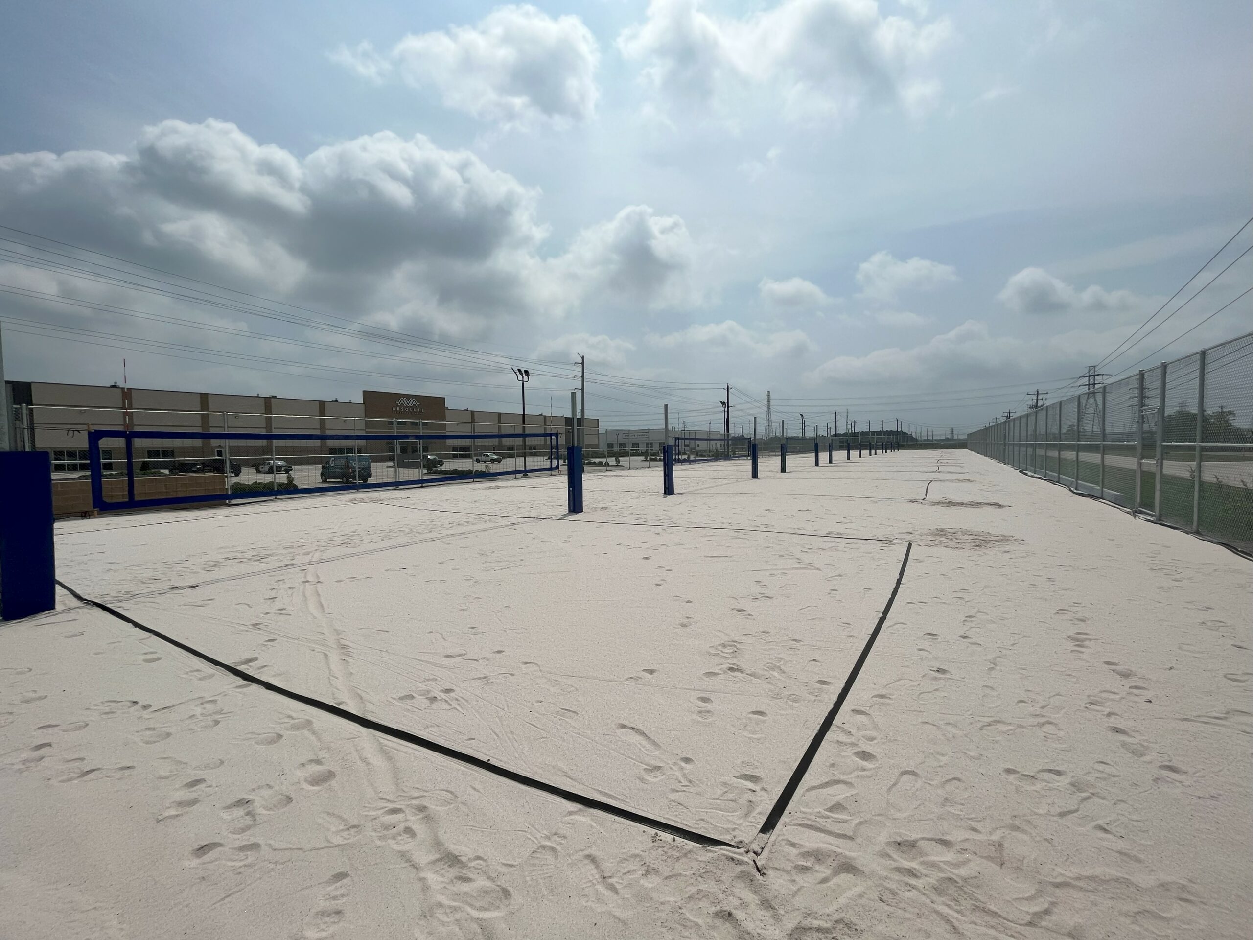 sand court with back fence